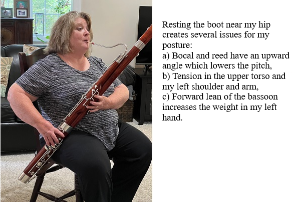 resting boot near hip tilts the bassoon forward