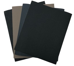 four pieces of wet/dry sandpaper, various grits